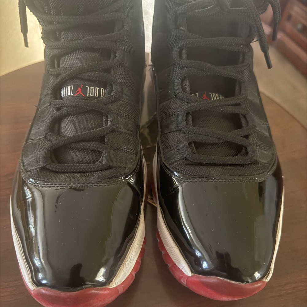 Jordan 11's Black and Red Athletic men's 12